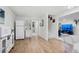 Basement with laminate flooring, refrigerator, staircase, and leads to another room at 2295 Sandhurst Dr, Castle Rock, CO 80104
