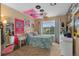 Cozy bedroom with eclectic decor, soft lighting, and a comfortable bed at 2295 Sandhurst Dr, Castle Rock, CO 80104