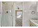 Bathroom with shower and view to bedroom at 1059 Racine St, Aurora, CO 80011