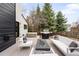 Inviting back deck with stylish outdoor furniture, grill, hot tub, and fire pit, perfect for relaxation at 4362 Peach Ct, Boulder, CO 80301
