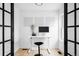 Contemporary office space with a standing desk, natural light, and minimalist decor at 4362 Peach Ct, Boulder, CO 80301