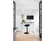 Clean and bright home office featuring a modern desk setup and minimalist wall decor at 4362 Peach Ct, Boulder, CO 80301