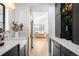Modern kitchen featuring marble countertops, wood cabinetry, and stainless steel appliances at 4362 Peach Ct, Boulder, CO 80301