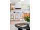 Bright kitchen featuring modern appliances, a white subway tile backsplash, and wood cabinetry at 4362 Peach Ct, Boulder, CO 80301