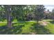 Charming front yard surrounded by mature trees, offering a tranquil atmosphere at 6430 Silver Mesa Dr # D, Highlands Ranch, CO 80130