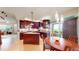 Bright kitchen featuring stainless steel appliances and hardwood floors at 6430 Silver Mesa Dr # D, Highlands Ranch, CO 80130