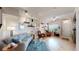 Bright living room with hardwood floors, stylish furnishings, and natural light at 6430 Silver Mesa Dr # D, Highlands Ranch, CO 80130
