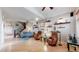 Spacious living room with hardwood floors, modern furniture, and decor at 6430 Silver Mesa Dr # D, Highlands Ranch, CO 80130