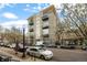 Contemporary building exterior with multiple balconies and street parking at 1050 Cherokee St # 403, Denver, CO 80204