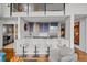 Open concept kitchen with stainless steel appliances and breakfast bar seating at 1050 Cherokee St # 403, Denver, CO 80204