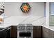 Kitchen showcases stainless steel range, quartz counters and a unique wall clock at 1050 Cherokee St # 403, Denver, CO 80204