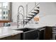 Modern kitchen sink with stainless steel faucet and sleek countertops at 1050 Cherokee St # 403, Denver, CO 80204
