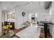 Cozy living room leads to home office area, with art and a modern aesthetic at 1050 Cherokee St # 403, Denver, CO 80204