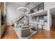 Spacious living room featuring hardwood floors, modern furniture, and an open floor plan at 1050 Cherokee St # 403, Denver, CO 80204