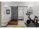 Stylish office space with barn door, Peloton bike, and access to a modern bathroom at 1050 Cherokee St # 403, Denver, CO 80204
