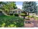 Beautiful craftsman home with landscaped yard and inviting front porch at 2551 S Gilpin St, Denver, CO 80210