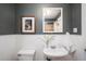 Clean bathroom with white sink and gray walls at 1127 Clayton St, Denver, CO 80206