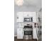 Stainless steel appliances and white cabinetry at 1127 Clayton St, Denver, CO 80206