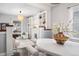 Bright living room features a fireplace and built-in shelving at 1127 Clayton St, Denver, CO 80206