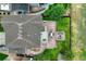 Aerial view of the home and backyard featuring a patio, deck and luscious lawn at 16747 E 97Th Pl, Commerce City, CO 80022