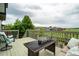 Back deck seating area with open views at 16747 E 97Th Pl, Commerce City, CO 80022