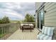 Back deck with seating and open views at 16747 E 97Th Pl, Commerce City, CO 80022