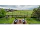 Aerial view of backyard and patio, complete with fire pit at 16747 E 97Th Pl, Commerce City, CO 80022