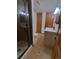 Full bathroom featuring glass shower and a sleek vanity with modern fixtures at 9983 Cottoncreek Dr, Highlands Ranch, CO 80130