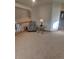 Inviting living room area with comfortable seating and a decorative chair at 9983 Cottoncreek Dr, Highlands Ranch, CO 80130