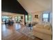 Bright living room featuring hardwood floors, many windows and neutral furnishings at 9983 Cottoncreek Dr, Highlands Ranch, CO 80130