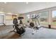 Bright basement with a home gym and wet bar at 6062 S Emporia Cir, Englewood, CO 80111