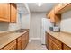 Well-equipped kitchen with ample storage, countertop space, and modern appliances at 709 Arrow Ct, Lafayette, CO 80026