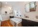 Bright bathroom with a soaking tub, double sinks, and natural light at 544 N Logan St, Denver, CO 80203