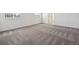 Bright bedroom with neutral decor and plush carpet at 1876 Chaffee Crest Dr, Berthoud, CO 80513
