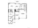 First floor plan showing layout with kitchen, living, dining, and garage at 1876 Chaffee Crest Dr, Berthoud, CO 80513