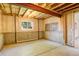 Spacious unfinished basement with concrete walls, partially insulated, and a window for natural light at 160 Las Lunas St, Castle Rock, CO 80104