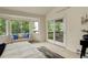 Inviting bedroom with a bay window, balcony access, and comfortable seating at 160 Las Lunas St, Castle Rock, CO 80104