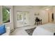 Well-lit bedroom with access to a private balcony and an ensuite bathroom at 160 Las Lunas St, Castle Rock, CO 80104
