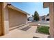 Stucco-clad house with a well-manicured lawn and a walkway to the front door at 160 Las Lunas St, Castle Rock, CO 80104