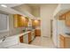 Bright kitchen features white appliances, ample cabinet space, and a functional layout at 160 Las Lunas St, Castle Rock, CO 80104