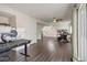 Open basement area with desks, monitors, exercise equipment, and a large finished space at 239 S Old Hammer St, Aurora, CO 80018