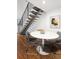 Modern dining area features a sleek table and unique transparent chairs at 505 Detroit St, Denver, CO 80206
