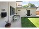 The exterior showcases a well-maintained lawn and a charming outdoor seating area at 505 Detroit St, Denver, CO 80206