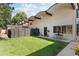 Well-manicured front yard featuring modern architecture and an inviting outdoor seating area at 505 Detroit St, Denver, CO 80206