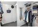 Spacious walk-in closet with rods, shelving, and storage space for clothing and accessories at 505 Detroit St, Denver, CO 80206
