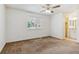 Bedroom with a window and view of the bathroom area at 9427 W 89Th Cir, Broomfield, CO 80021