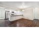 Bright open-concept kitchen featuring stainless steel appliances and granite countertops at 9427 W 89Th Cir, Broomfield, CO 80021