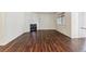 Spacious living room with wood floors and a stone fireplace at 9427 W 89Th Cir, Broomfield, CO 80021