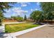 Community playground with slide, picnic table, and grassy area at 9427 W 89Th Cir, Broomfield, CO 80021