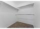 Large walk-in closet with double hanging rods and ample shelving at 12525 E Tennessee Cir # E, Aurora, CO 80012